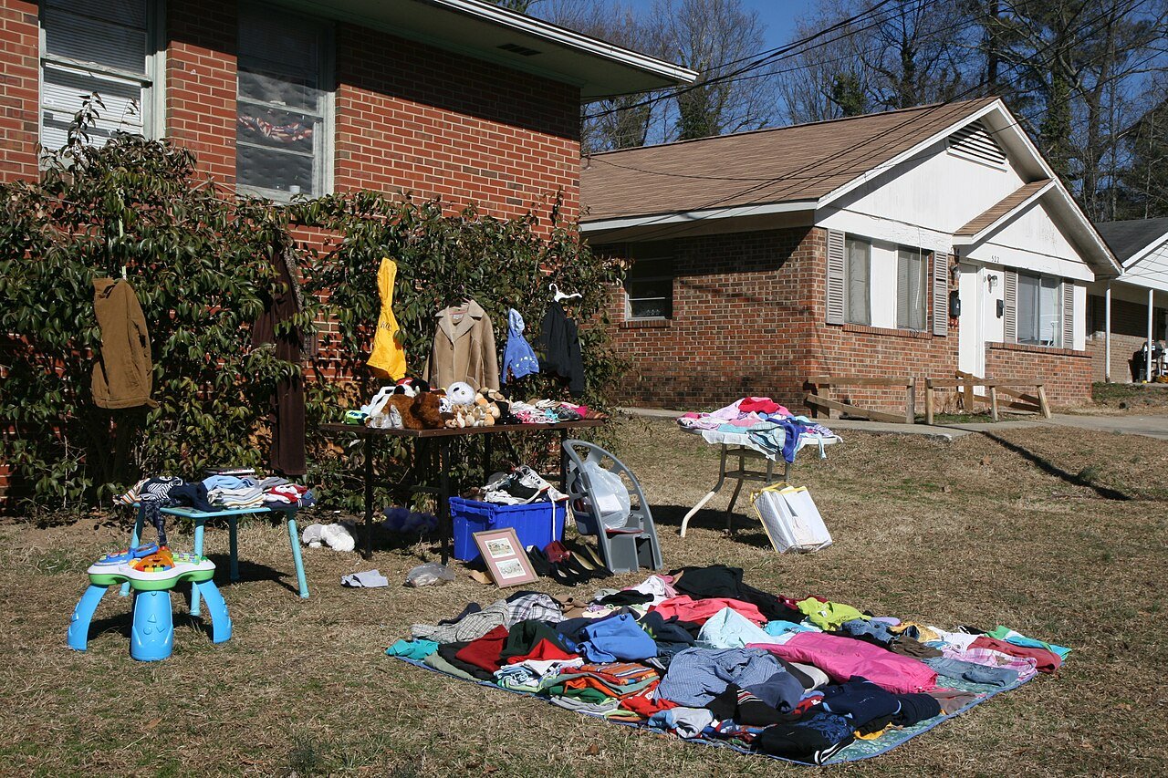 Household goods laid out for sale on a lawn in Durham, North Carolina